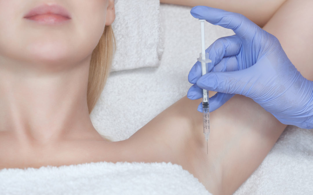 BOTOX injection being placed in the arm pit.