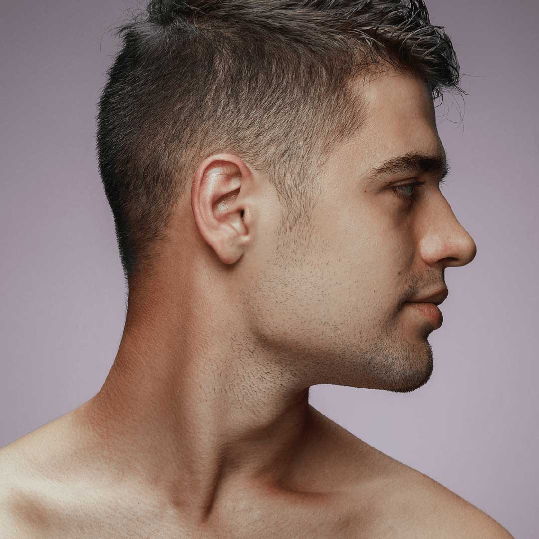 Male with defined, sculpted jawline and strong chin