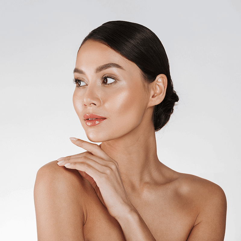 Woman looking up with smooth neck and defined jawline