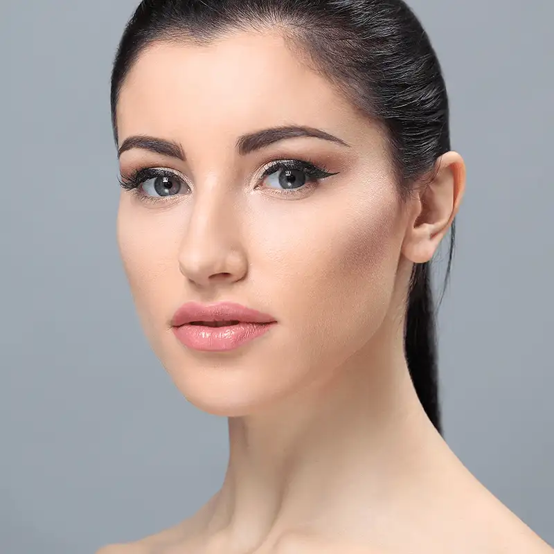 Lip rejuvenation with dermal fillers to restore volume, smooth lines, and enhance natural lip shape for a youthful appearance.